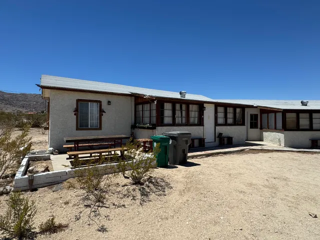a view of a house with a roof deck