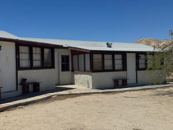 a view of a house with a patio