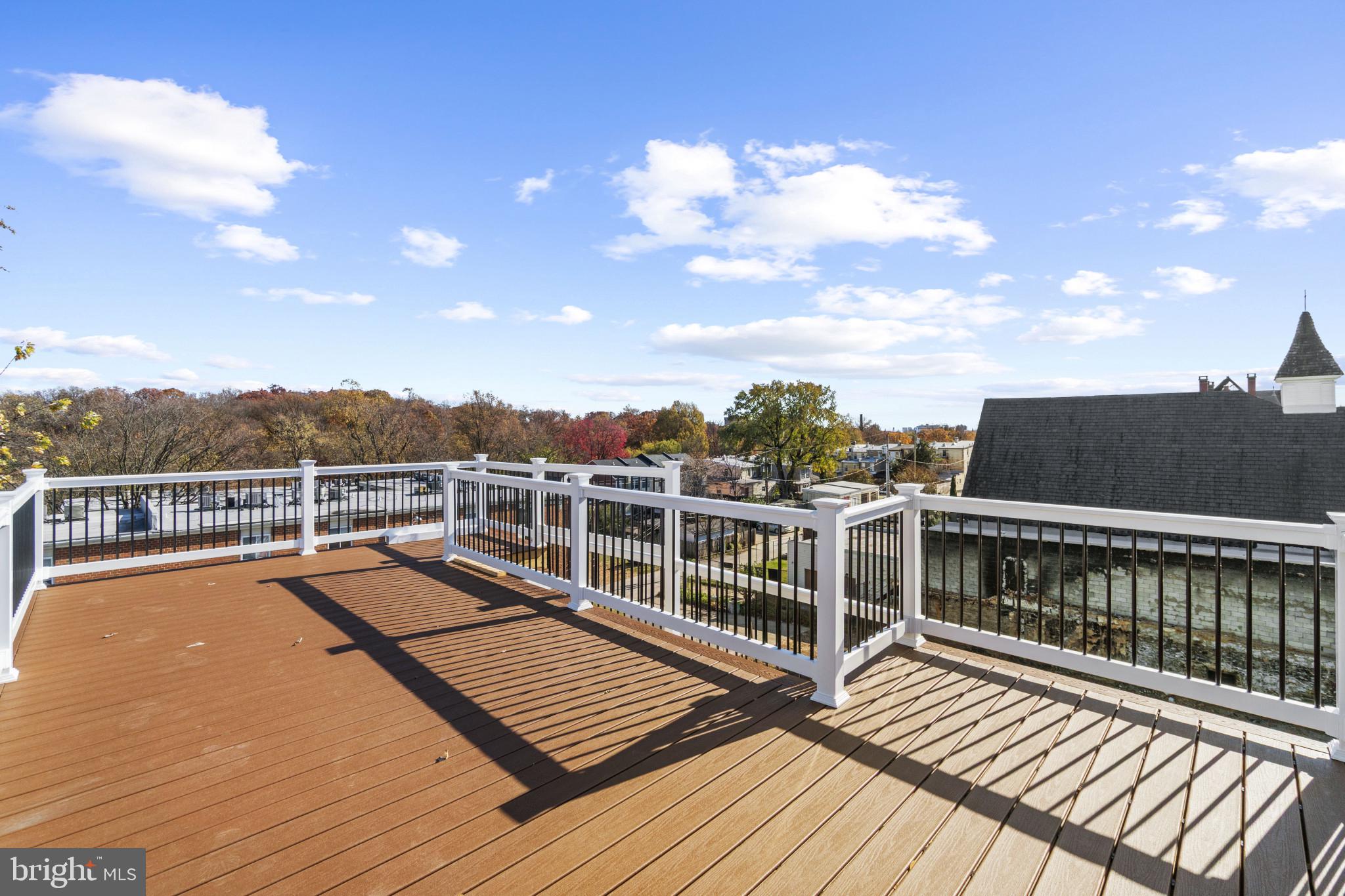 3461 Keswick Road Baltimore, MD 21211 - Photo 13 of 33 a view of balcony with wooden floor and city view