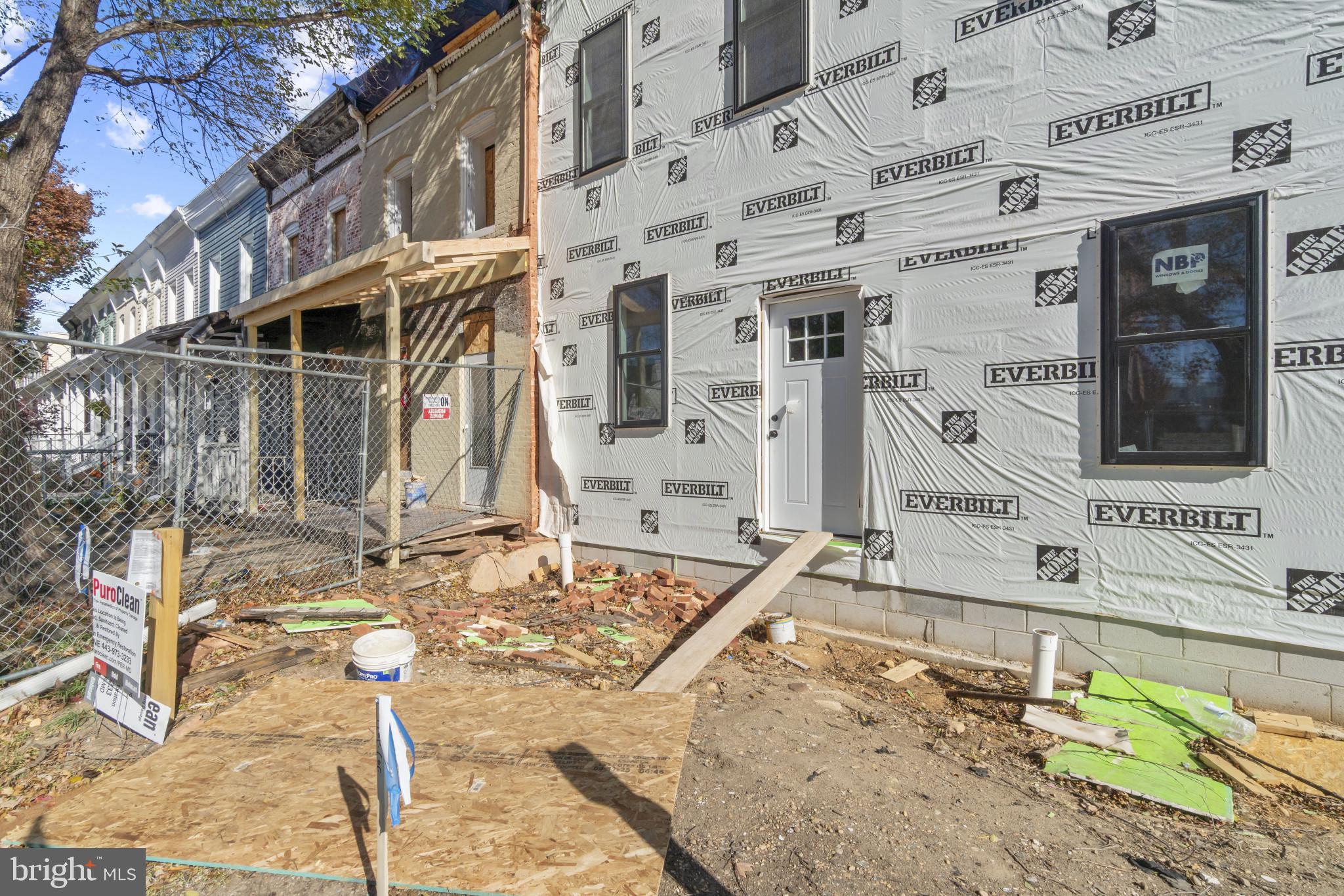 3461 Keswick Road Baltimore, MD 21211 - Photo 33 of 33 a building with large window and wooden fence