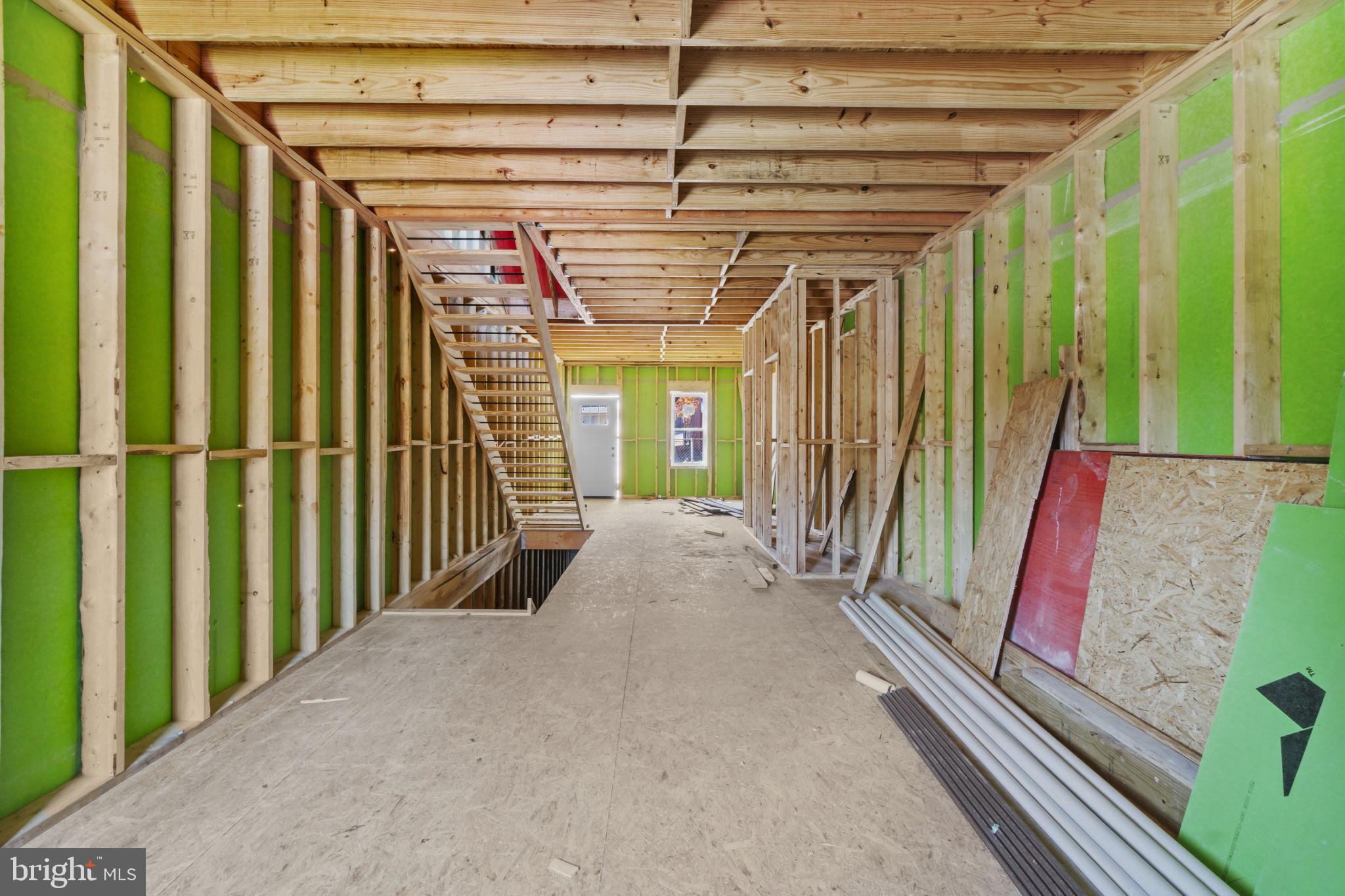 3461 Keswick Road Baltimore, MD 21211 - Photo 6 of 33 a view of a porch with wooden floor and stairs