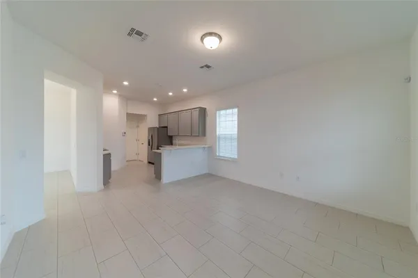 a view of kitchen and windows