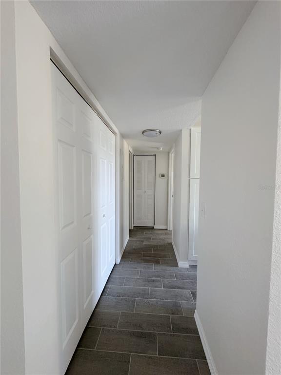 1013 South Hiawassee Road, Unit 3635 Orlando, FL 32835 - Photo 11 of 20 a view of gallery with wooden floor