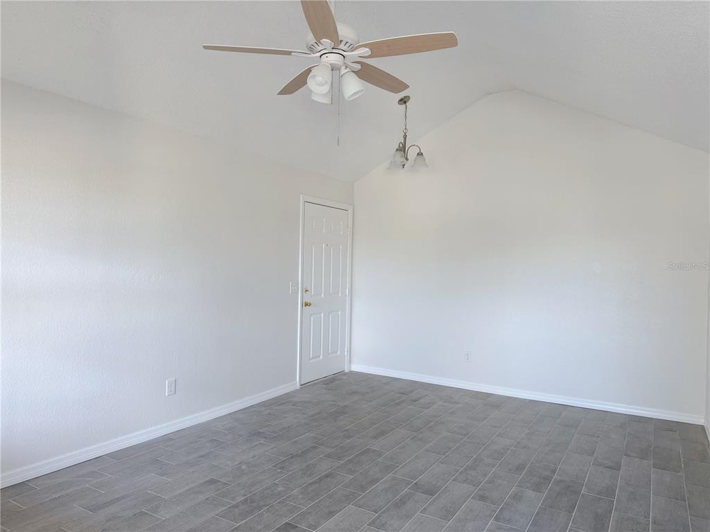 1013 South Hiawassee Road, Unit 3635 Orlando, FL 32835 - Photo 5 of 20 a view of a room with a fan