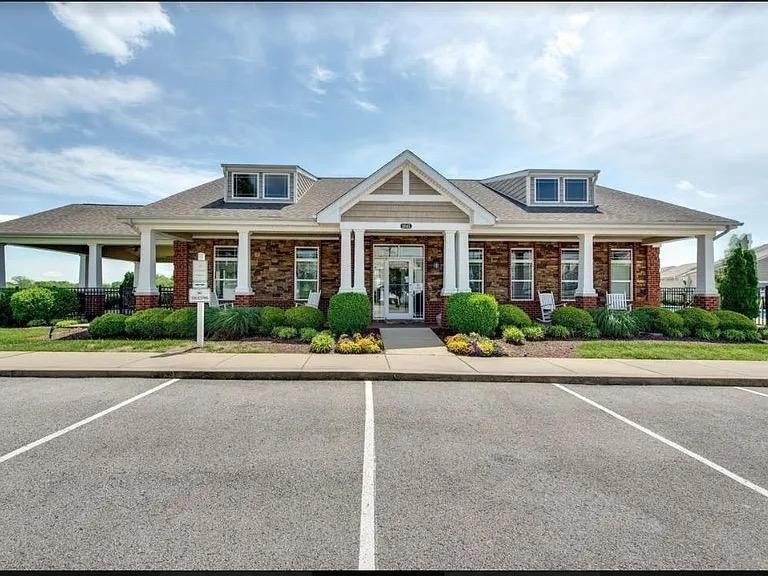 4007 Angelica Ct Spring Hill Spring Hill, TN 37174 - Photo 13 of 16 a front view of a house with a garden and plants