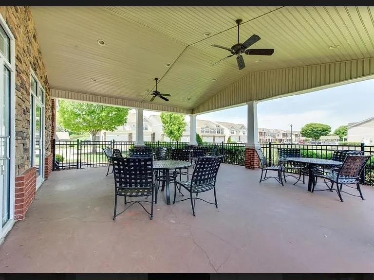 4007 Angelica Ct Spring Hill Spring Hill, TN 37174 - Photo 15 of 16 a view of a patio with table and chairs