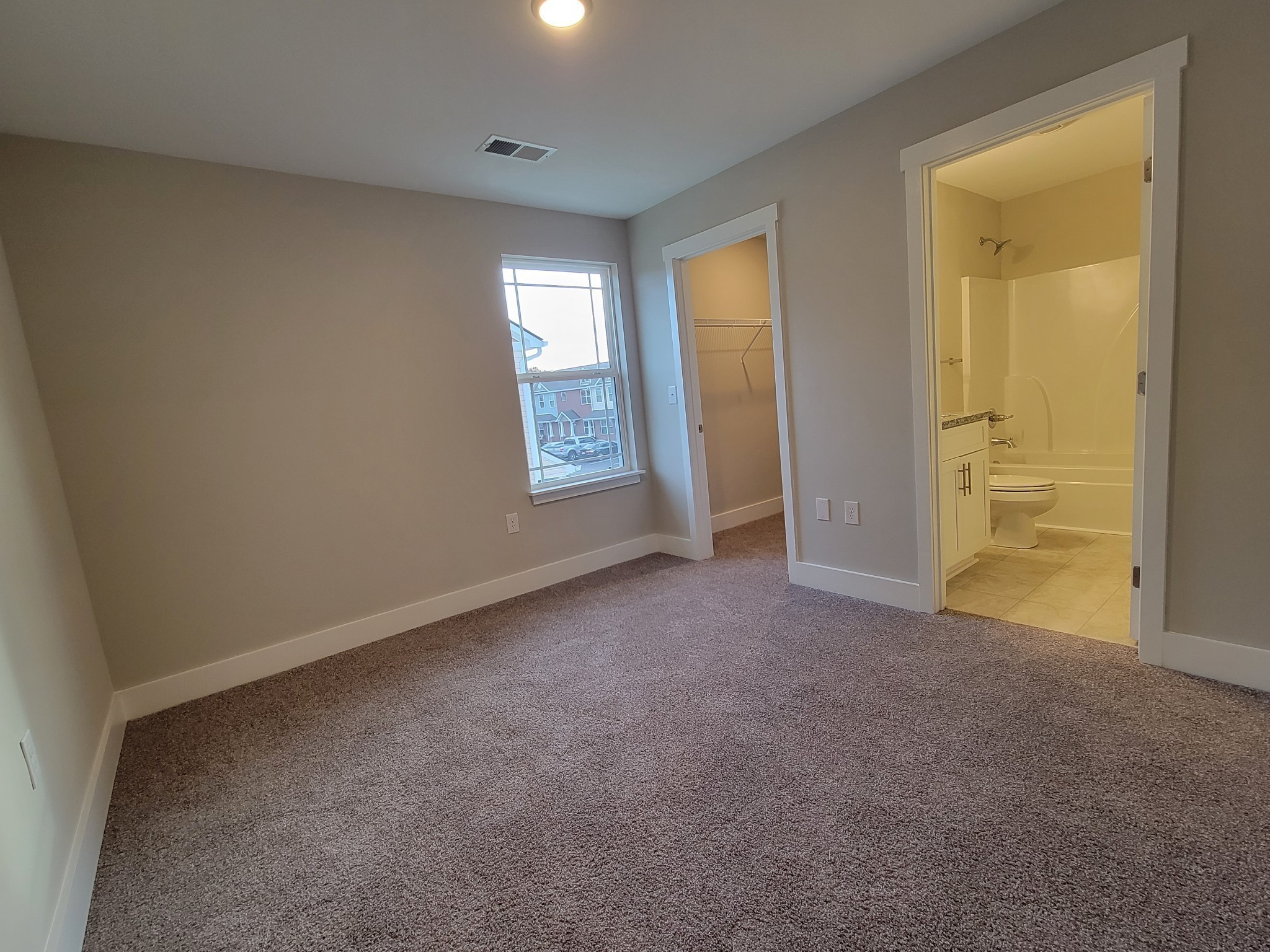 4007 Angelica Ct Spring Hill Spring Hill, TN 37174 - Photo 9 of 16 an empty room with windows