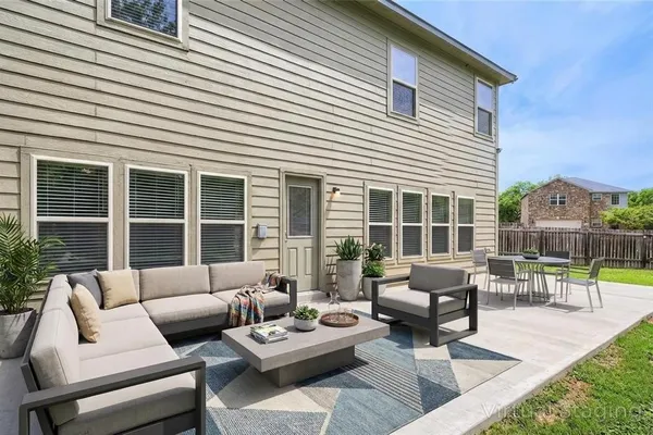 a view of a backyard with a garden and plants