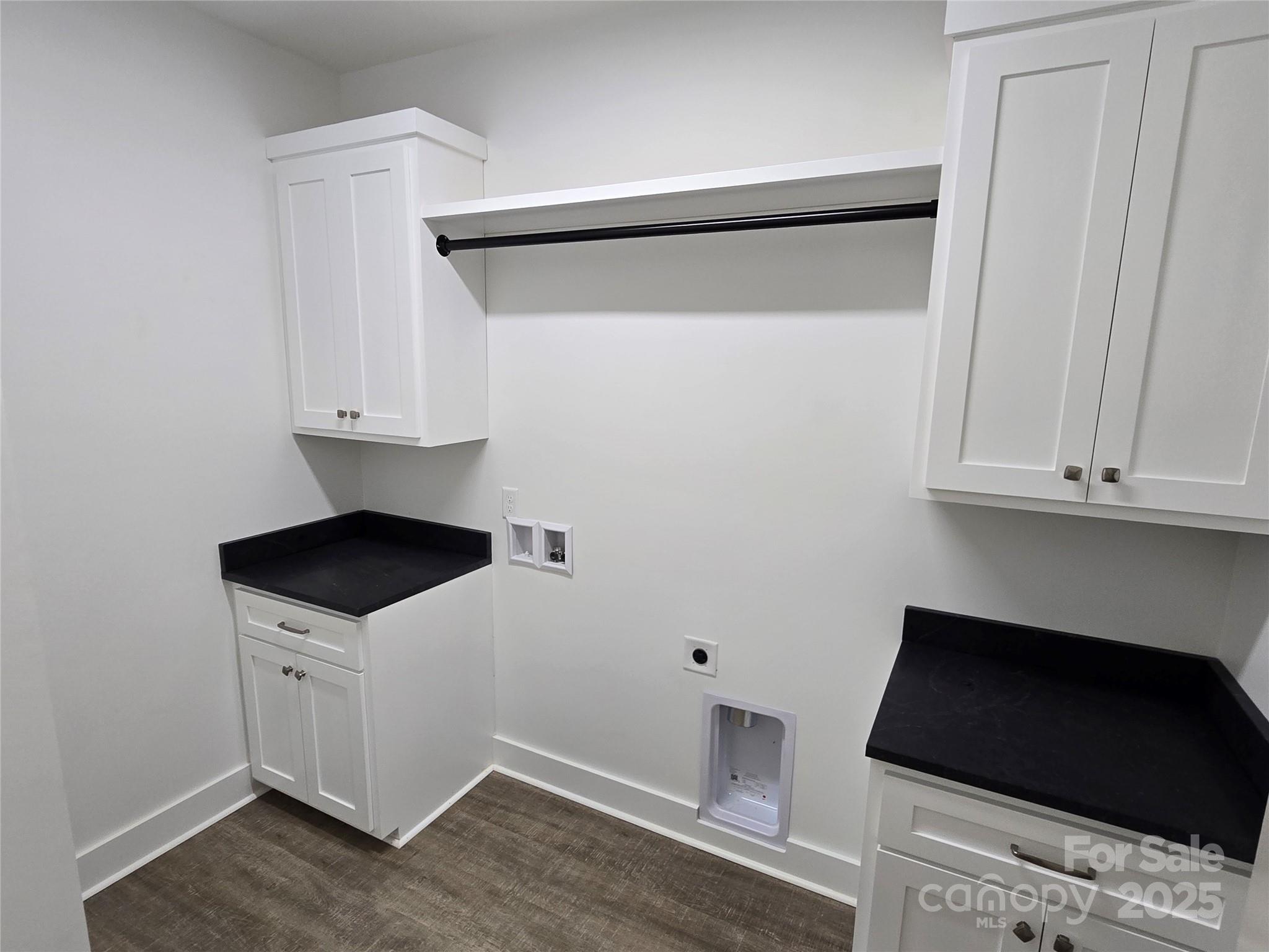768 8th Street Northeast Hickory, NC 28601 - Photo 12 of 21 a kitchen with a cabinets and a stove top oven