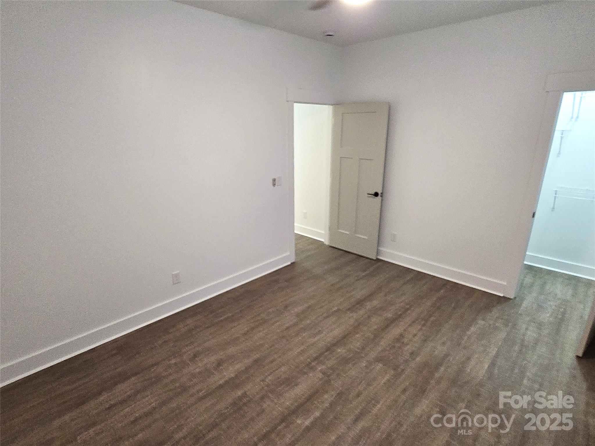 768 8th Street Northeast Hickory, NC 28601 - Photo 18 of 21 a view of an empty room with wooden floor