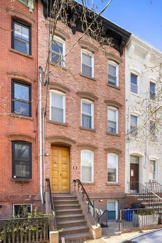 a front view of a brick building
