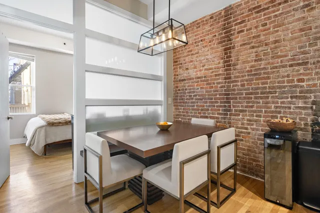 a view of a livingroom with furniture and window