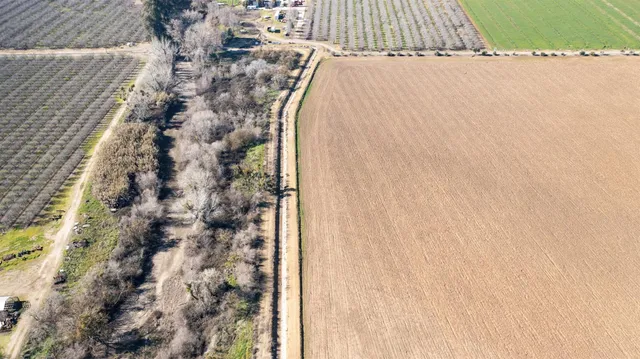 a view of a swimming pool and an outdoor space