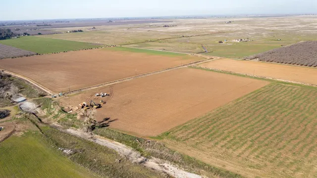 an aerial view of beach and ocean