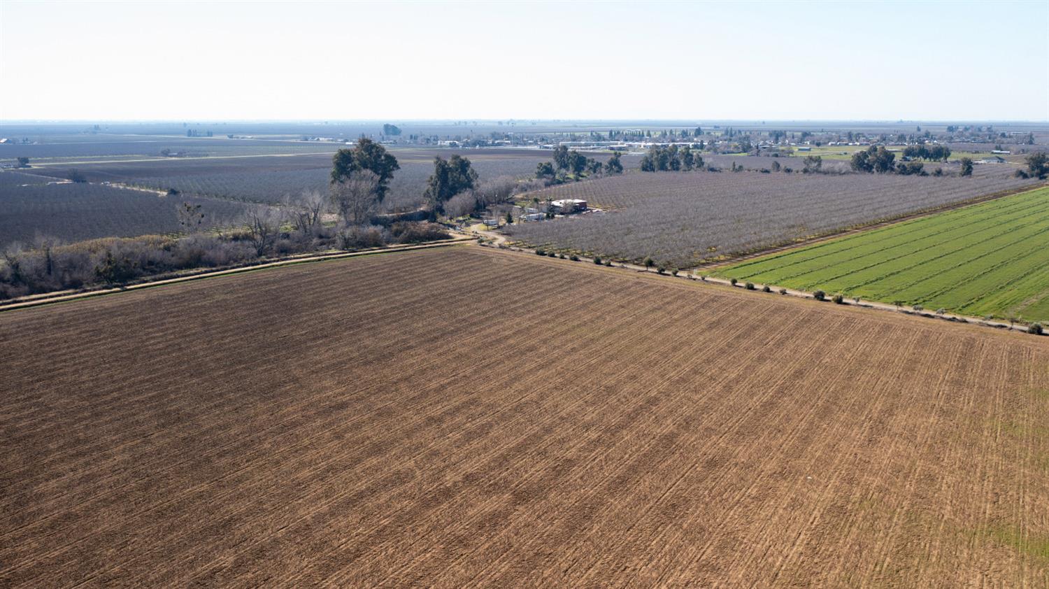 14100 Jordan Road Le Grand, CA 95333 - Photo 4 of 25 an aerial view of residential houses with outdoor space