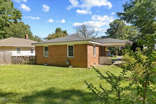 a house view with a garden space