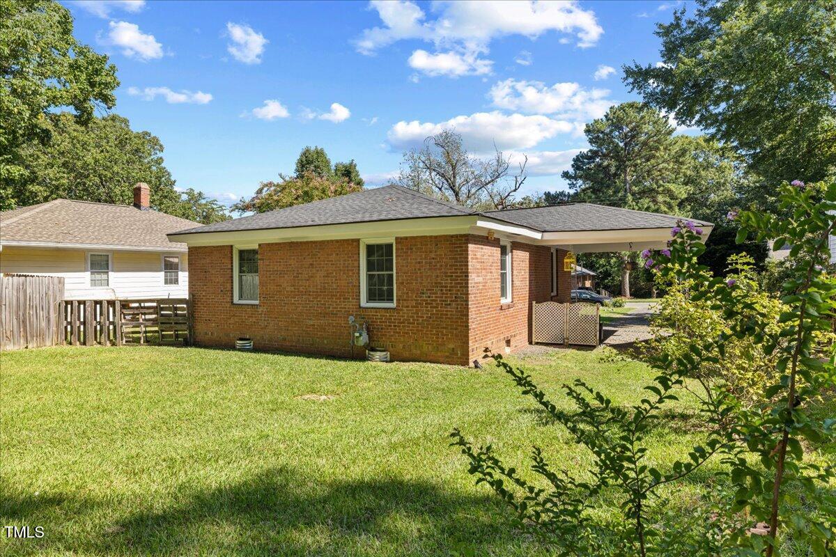 415 Edward Street Durham, NC 27701 - Photo 19 of 27 a view of a house with a yard