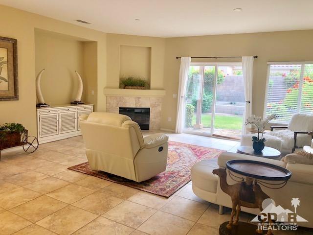 1255 Palmas Ridge Palm Springs, CA 92262 - Photo 3 of 34 a living room with furniture and a large window