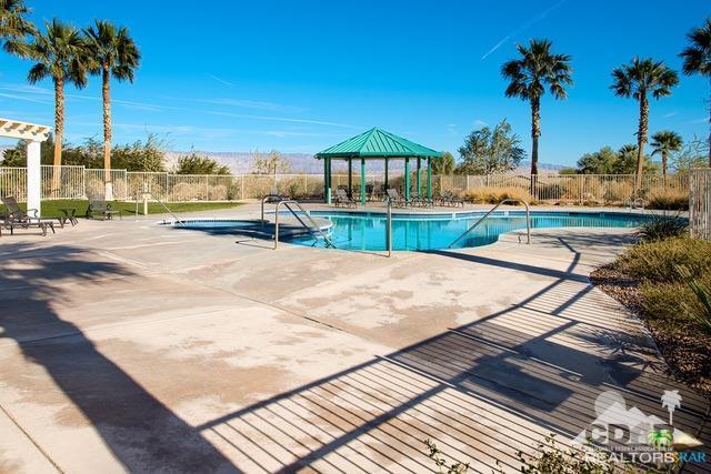 1255 Palmas Ridge Palm Springs, CA 92262 - Photo 33 of 34 a view of swimming pool with a lounge chair