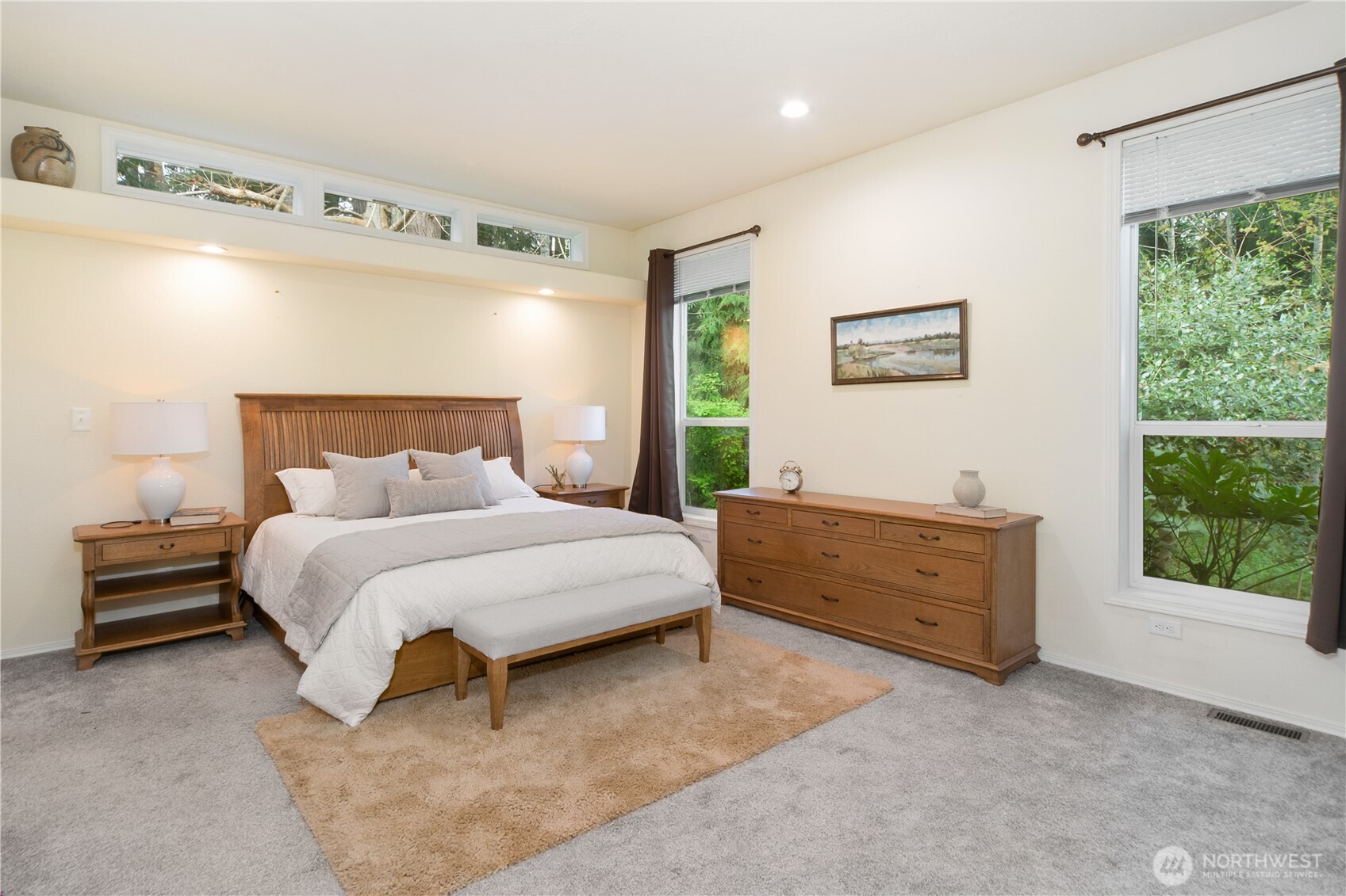 290 Werner Road Port Ludlow, WA 98365 - Photo 16 of 40 a bedroom with a bed and window