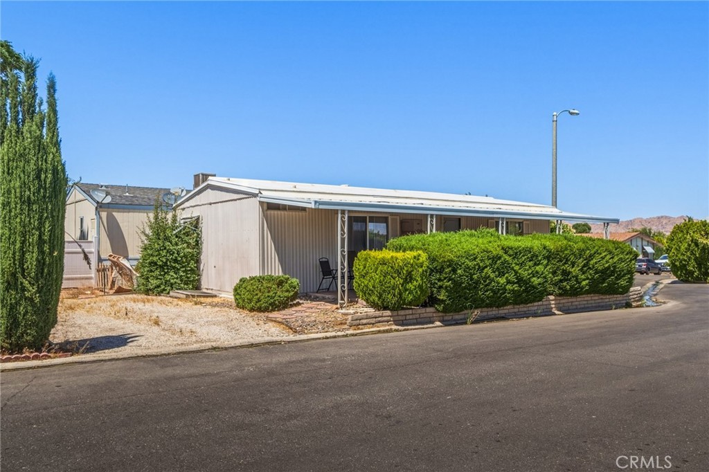 20683 Waalew Road, Unit B201 Apple Valley, CA 92307 - Photo 5 of 32 a house with a outdoor space