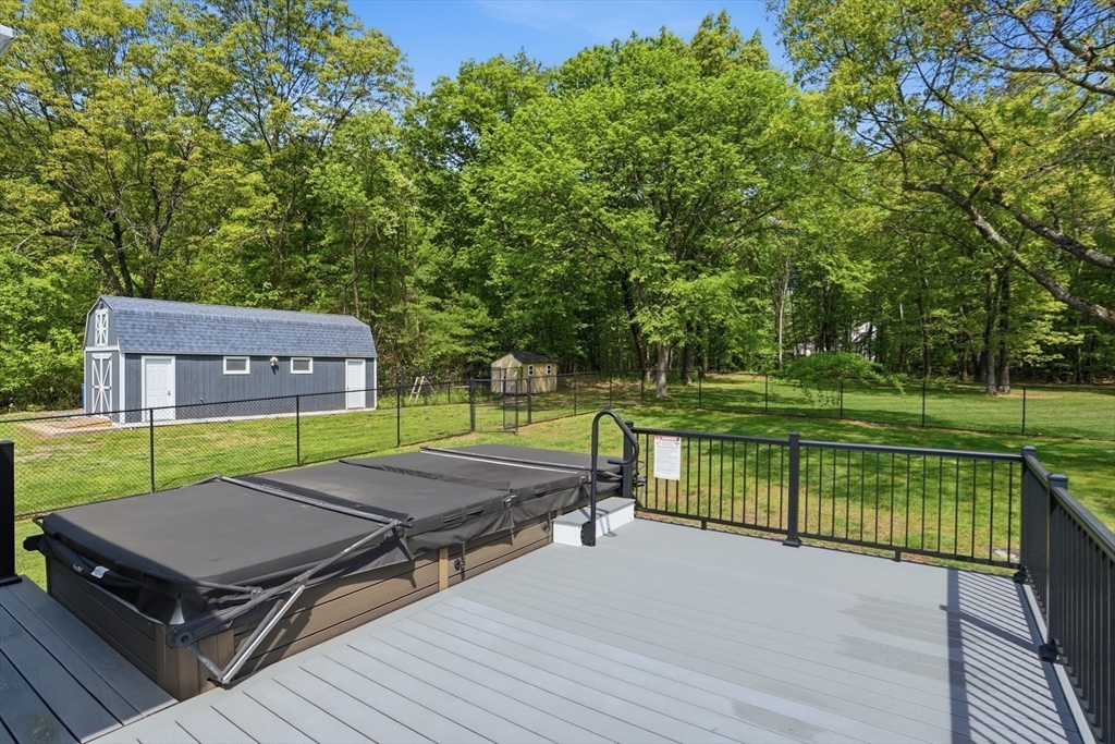 235 Kemp Street Dunstable, MA 01827 - Photo 35 of 42 a view of a patio with chairs next to yard