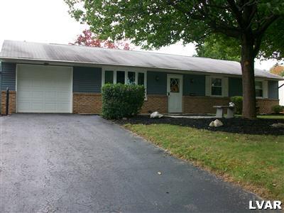 545 Clearfield Road Nazareth, PA 18064 - Photo 1 of 11 a front view of a house with a yard and garage