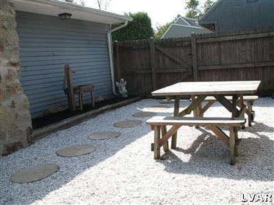 545 Clearfield Road Nazareth, PA 18064 - Photo 11 of 11 a view of a backyard with chair and table