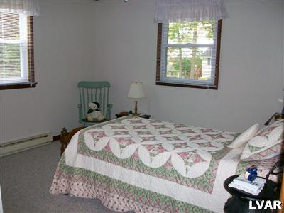 545 Clearfield Road Nazareth, PA 18064 - Photo 7 of 11 a bedroom with a bed and a window