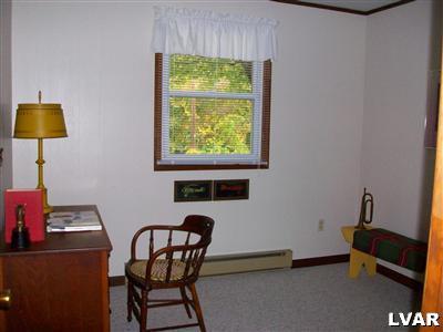 545 Clearfield Road Nazareth, PA 18064 - Photo 8 of 11 a view of a workspace with furniture and a window