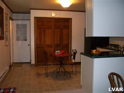 545 Clearfield Road Nazareth, PA 18064 - Photo 10 of 11 a room that has a table and chairs in it