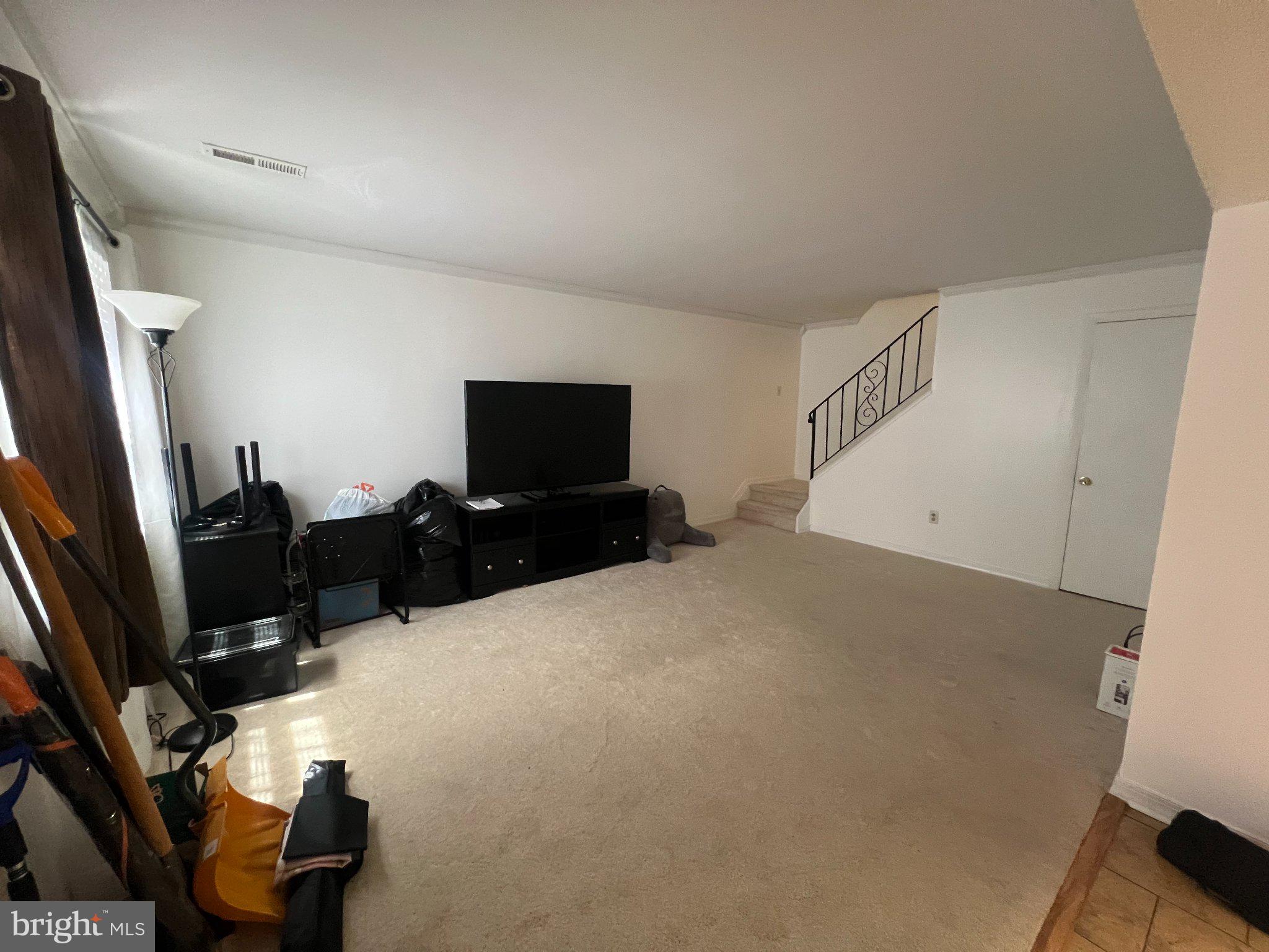 2904 State Hill Road, Unit F9 Reading, PA 19610 - Photo 4 of 30 Spacious living area with potential charm.