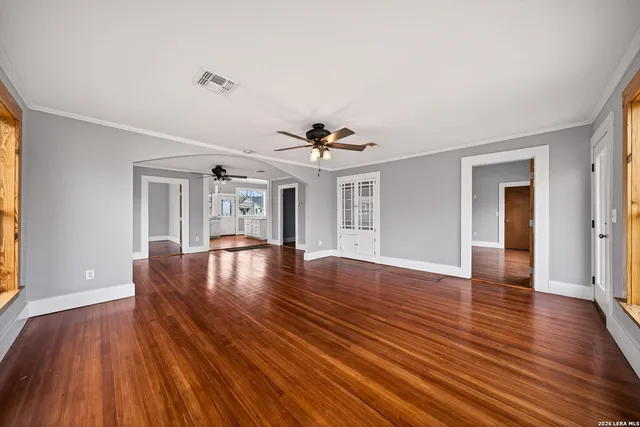 a view of livingroom with hardwood floor and ceiling fan