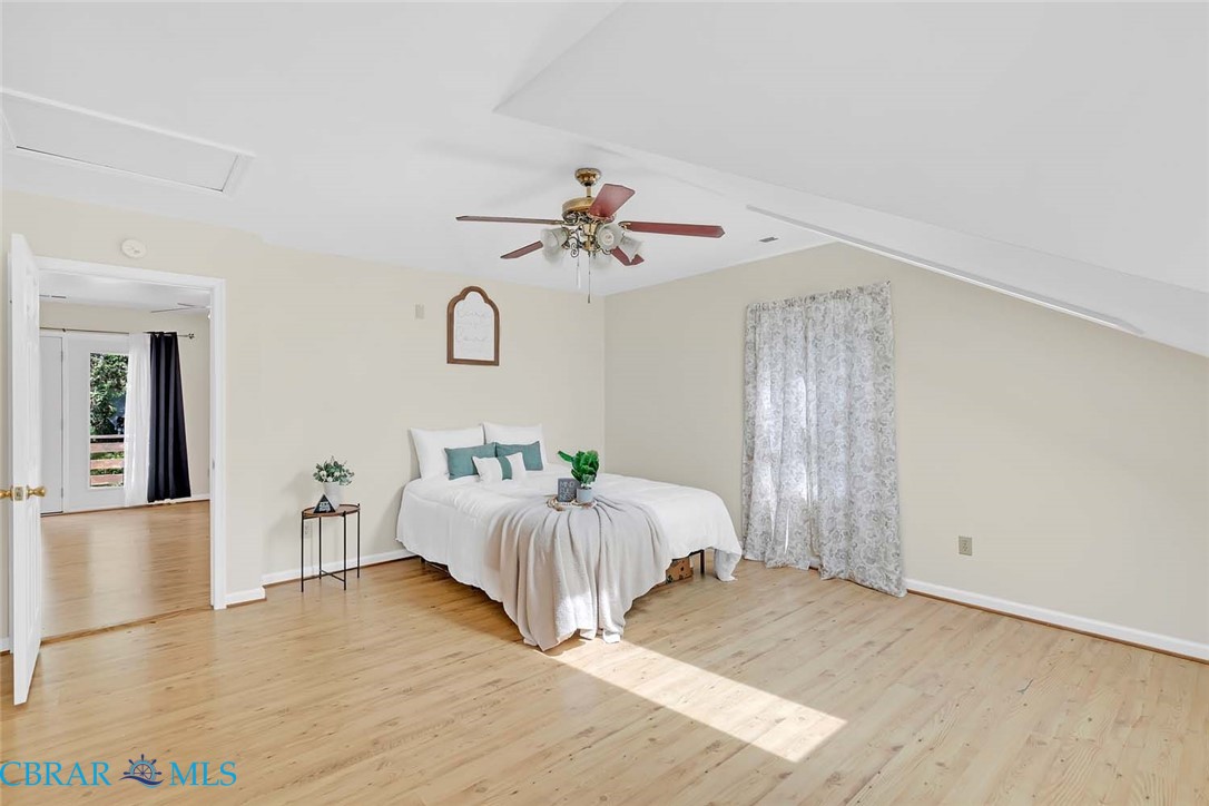 423 Kings Landing Road Onemo, VA 23130 - Photo 50 of 63 a living room with furniture and a chandelier