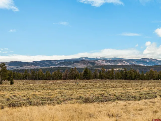 a view of lake and mountain