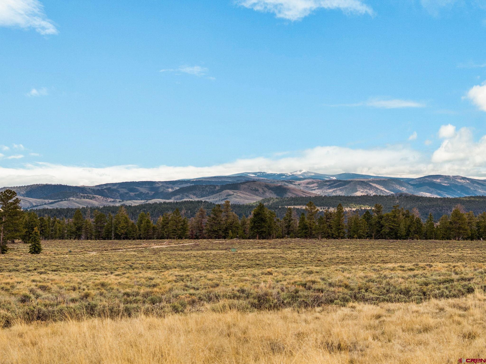 a view of lake and mountain