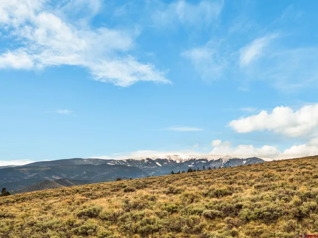 a view of lake and mountain