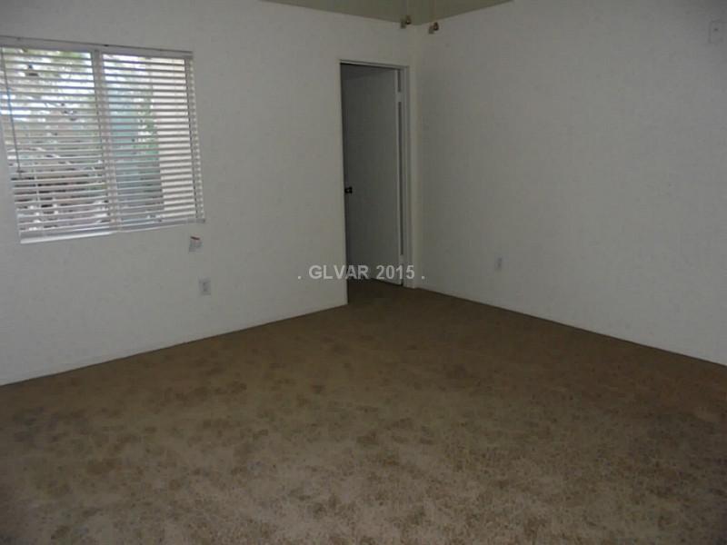 7885 West Flamingo Road, Unit 2168 Las Vegas, NV 89147 - Photo 16 of 35 Master Bedroom.