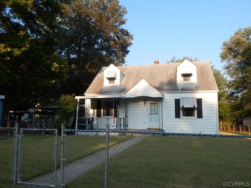 6723 Strathmore Road North Chesterfield, VA 23237 - Photo 14 of 15 a front view of a house with garden
