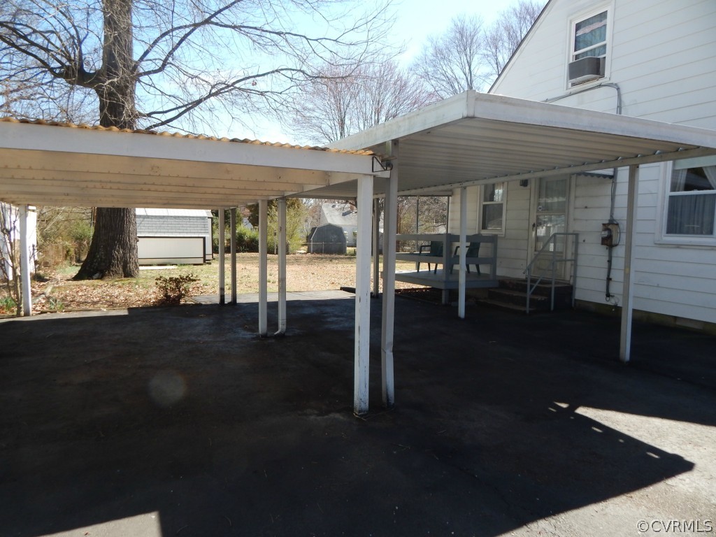 6723 Strathmore Road North Chesterfield, VA 23237 - Photo 10 of 15 a view of a patio with table and chairs
