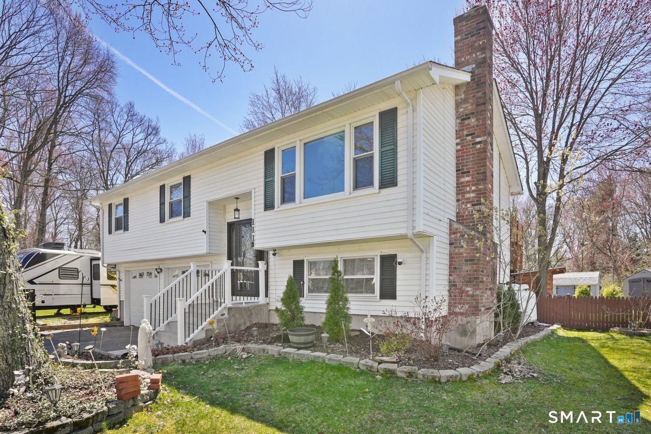111 Ione Drive Meriden, CT 06450 - Photo 22 of 37 a view of a house with backyard