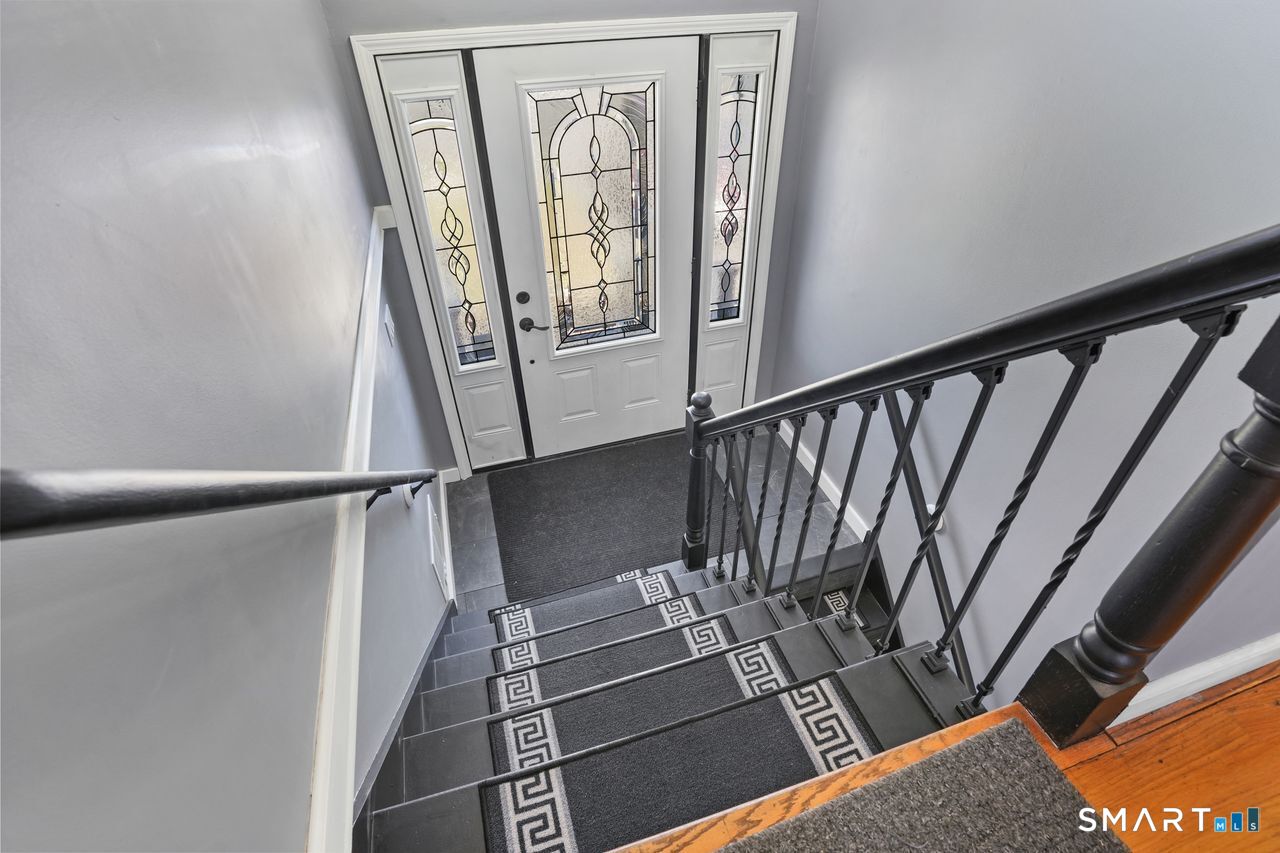 111 Ione Drive Meriden, CT 06450 - Photo 24 of 37 a view of balcony and wooden floor