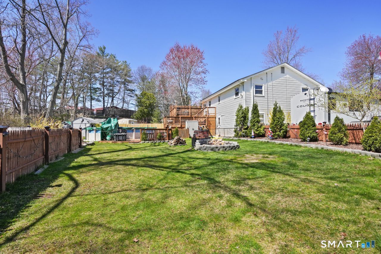 111 Ione Drive Meriden, CT 06450 - Photo 36 of 37 a view of a house with a big yard