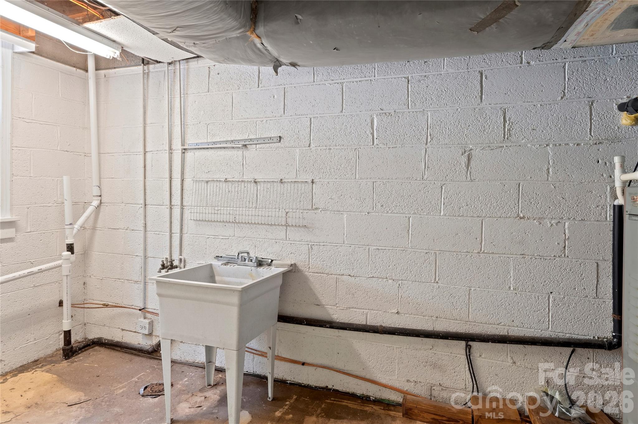 951 Dodson Mill Road Pilot Mountain, NC 27041 - Photo 32 of 48 a bathroom with a sink and a mirror