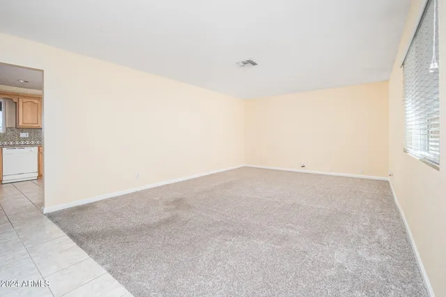 an empty room with a natural light