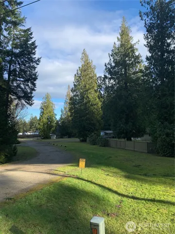 a view of a golf course with a lake