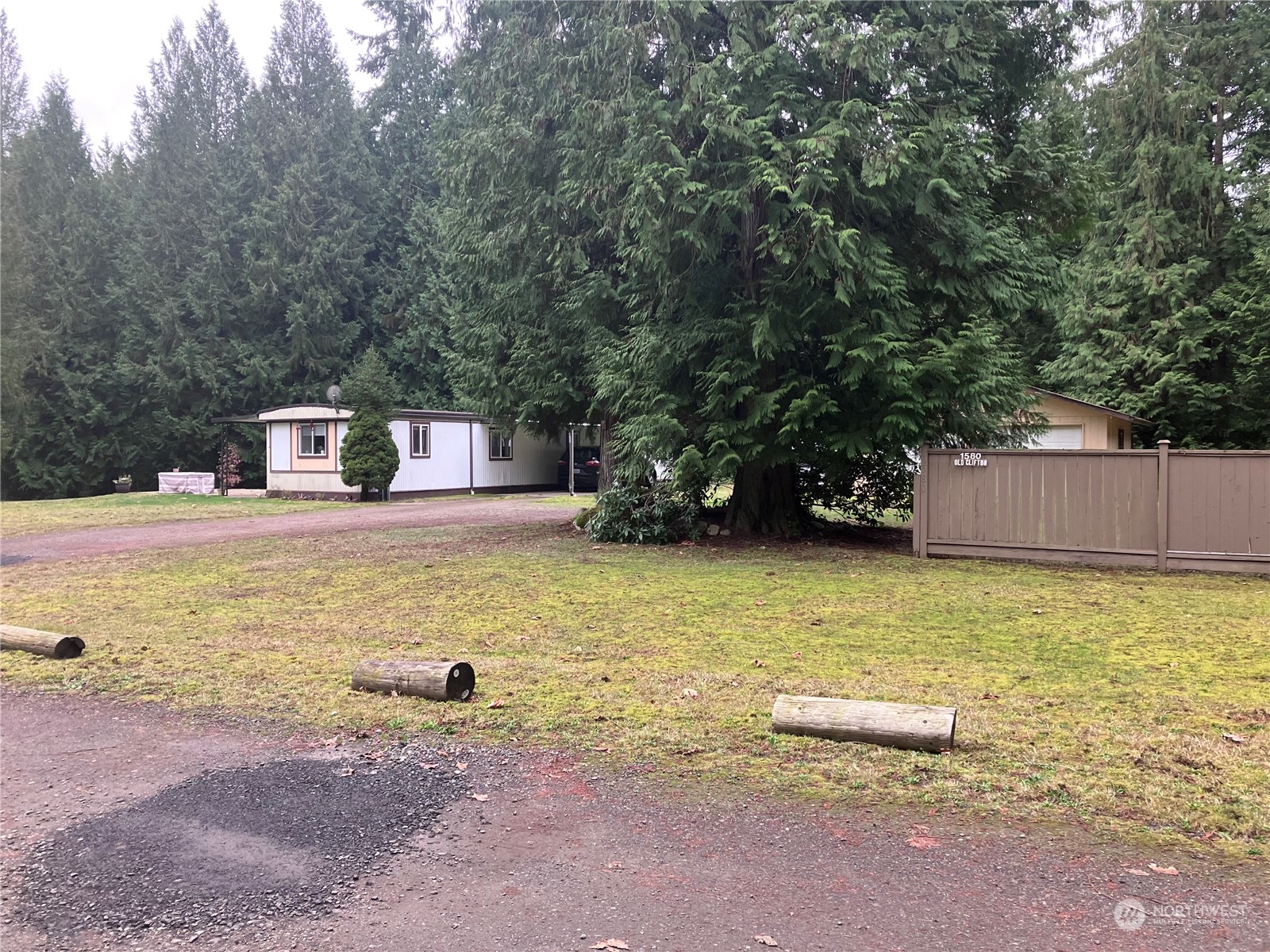 1566 Southwest Old Clifton Road Port Orchard, WA 98367 - Photo 5 of 11 a swimming pool with yard