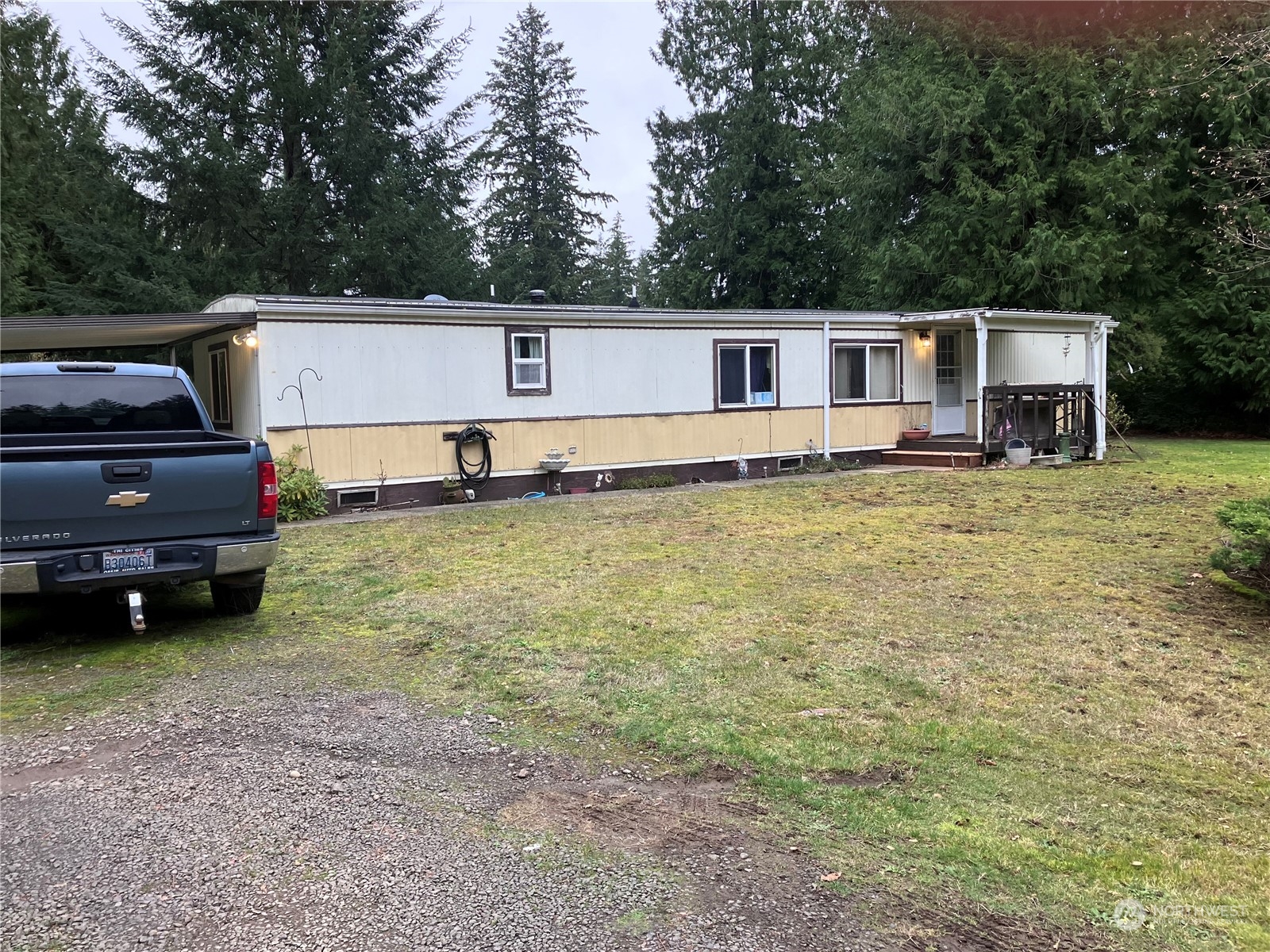 1566 Southwest Old Clifton Road Port Orchard, WA 98367 - Photo 7 of 11 a view of a house with a back yard