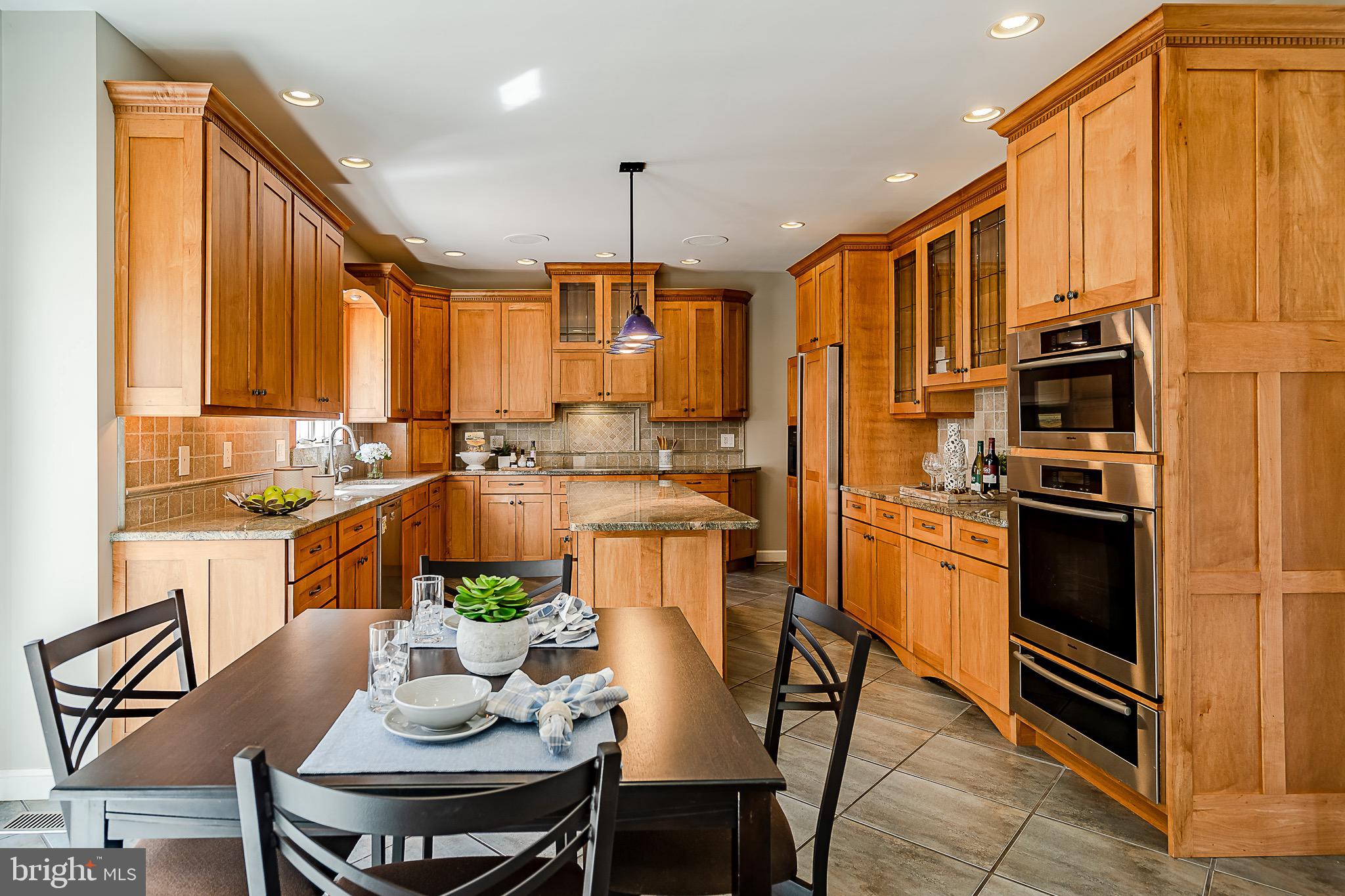 2008 Turnberry Circle Glenmoore, PA 19343 - Photo 12 of 62 Breakfast area into kitchen