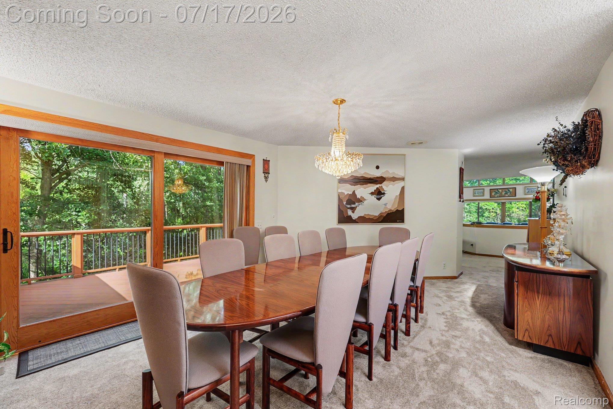 5685 Paint Valley Drive Rochester, MI 48306 - Photo 16 of 66 Spacious dining area featuring a prominent wood-finish dining table